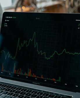 Laptop with financial graph