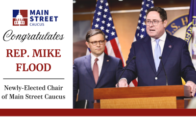 Photo of Representative flood at a podium with text reading,"Congratulations Representative Mike Flood - Newly elected chair of Main Street Caucus"